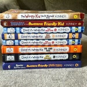 Eight “Diary of a Wimpy Kid” books written by Jeff Kinney. Excellent condition.